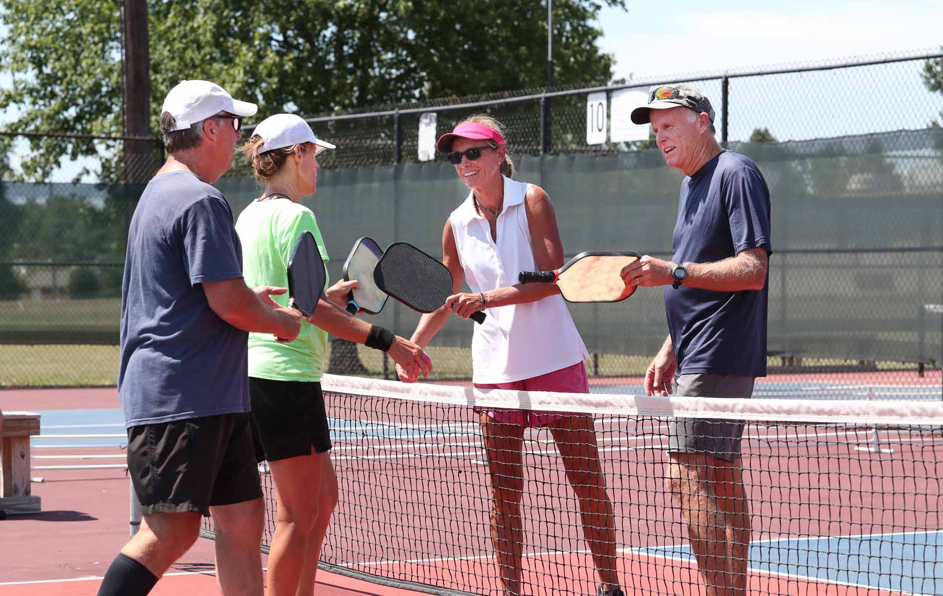 an image of a group plying pickleball
